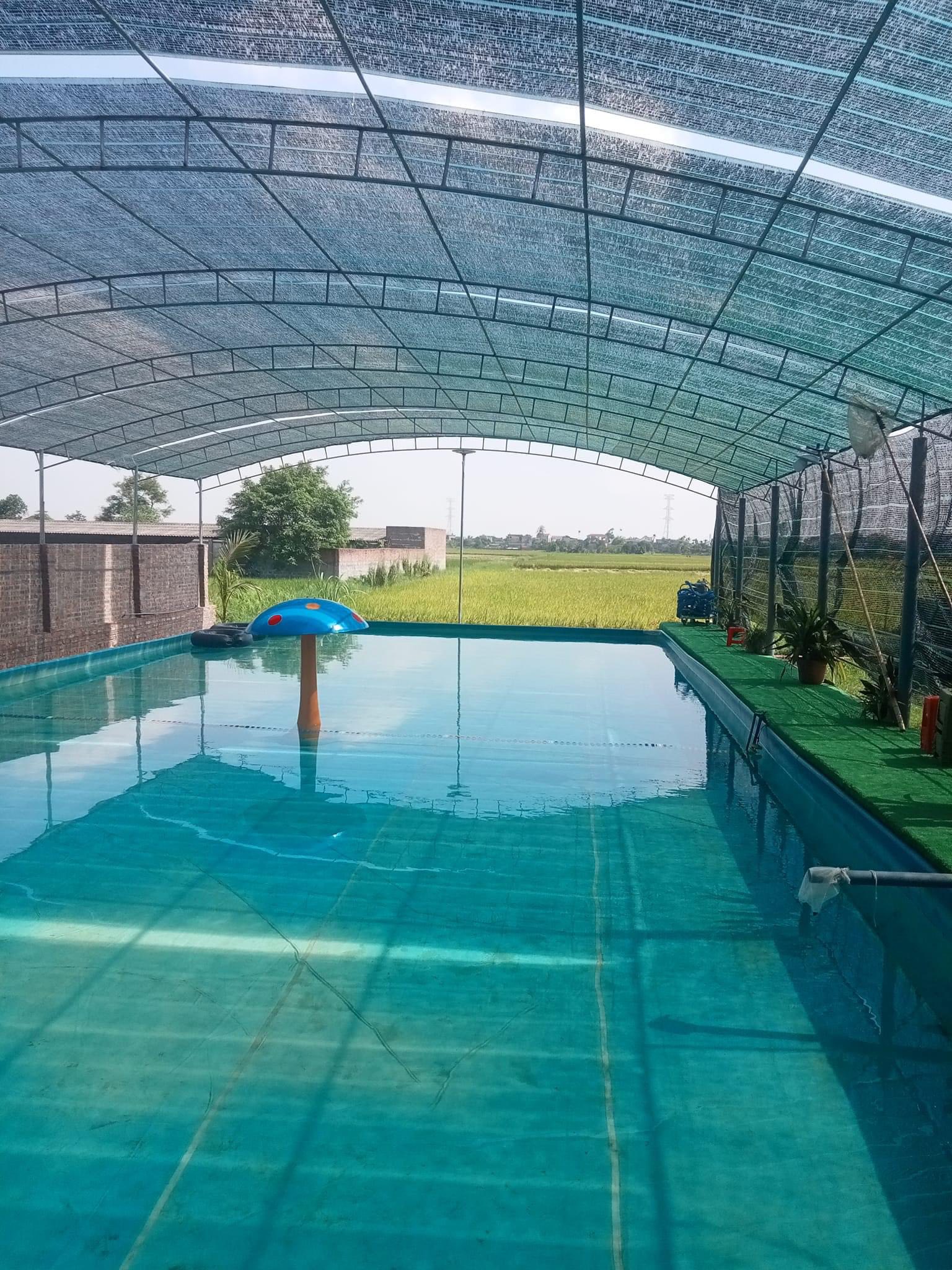 Lưới lan che nắng hồ bơi